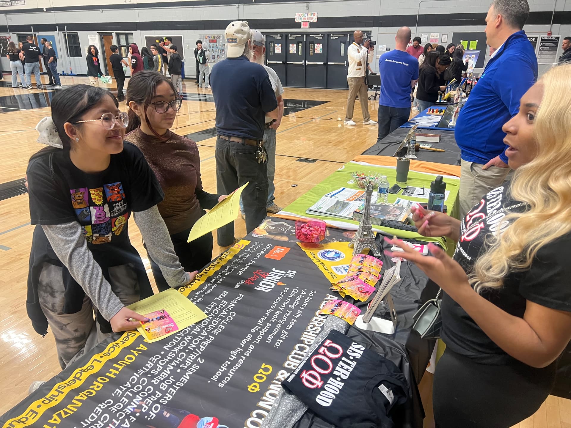 Junior Stars recruiting table at a school fair